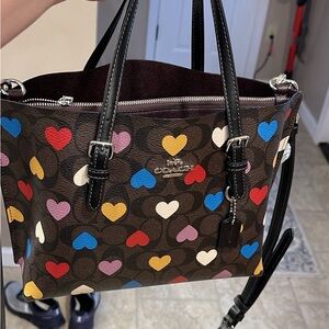 Coach purse and matching wallet. Only carried a few times.